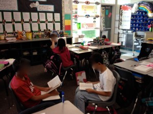 Reading with their partners. Working hard!